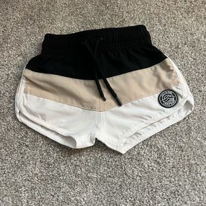 Little Biosy swim shorts size 6 month but runs small